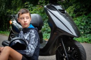 scooter, teenage boy, motorbike, baby, motorcyclist, driver, portrait, road, learn to drive, outdoors, teen, boy, kids, transport, headlight, enthusiasm, ride a motorcycle, get a driver's license
